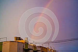 Qawra, Malta 30. may 2019 - rainbow over the residential buildings