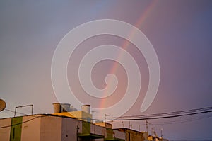 Qawra, Malta 30. may 2019 - rainbow over the residential buildings