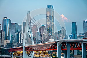 Qiansimen Bridge, Hongyadong and World Financial Center at sunset , Chongqing, China