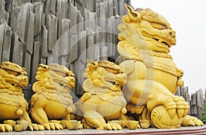 Qilin asian mythological golden statue