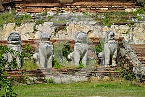 Qilin asian mythological guard statue in ancient Thai temple