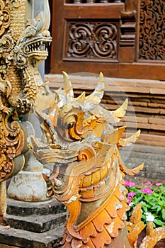 Qilin asian mythological wooden statue in Thailand wat