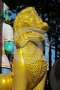Qilin mystic asian animal guard statue in Thailand temple Wat