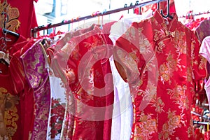 Qipao, cheongsam, or Chinese National dress sell on the street