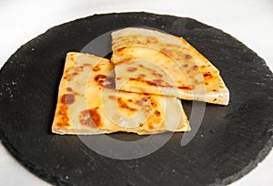 Qistibi - popular traditional dish in Tatarstan. Roasted flatbreads with mashed potato