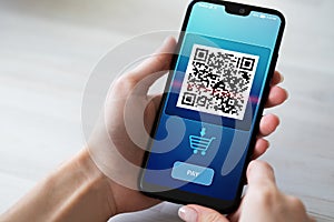 QR code mobile phone scan on screen. Business and technology concept.