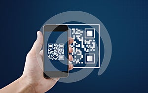 QR code scanning payment and verification. Hand using mobile smart phone scan QR code