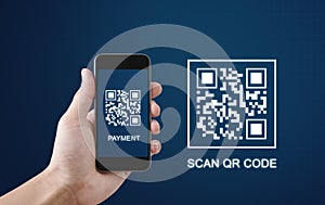 QR code scanning payment and verification. Hand using mobile smart phone scan QR code photo