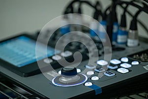 Qsc touchmix 16 professional audio digital mixer in a recording studio