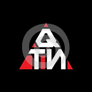QTM triangle letter logo design with triangle shape. QTM triangle logo design monogram. QTM triangle vector logo template with red