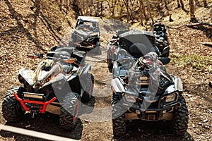 Quad ATV cars all terrain vehicle parked on mountain road
