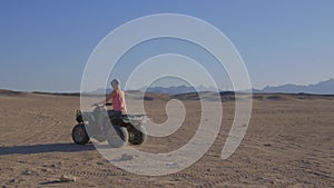 Quad bike ride through the desert near Hurghada, Egypt. Adventures in a desert.