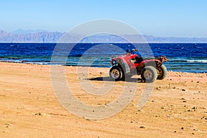 Quad bike at the shore of Red sea in Sinai desert