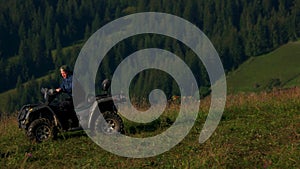 Quad bikes riding in mountain.