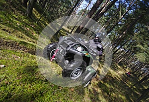 Quad in forest (ATV) photo