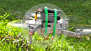 Quadcoper with extra battery is flying photo