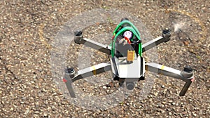 Quadcoper with extra battery is flying photo