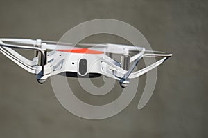 Quadcopter drone in flight with digital camera