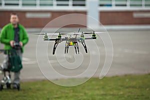 Quadcopter Drone flying in an urban area