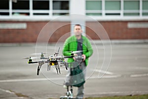 Quadcopter Drone flying in an urban area