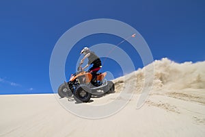 Quadding in sand dunes