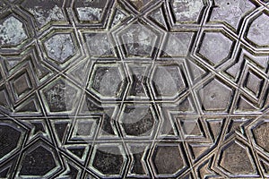 The quadrilateral patterns on the historical door of the Ottoman period close up.