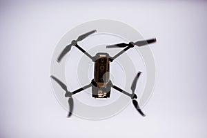 Quadrocopters with camera during flight in the sky