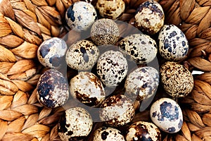 Quail eggs in basket, close-up