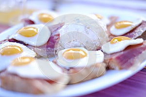Quail eggs, ham and salad from Seville photo