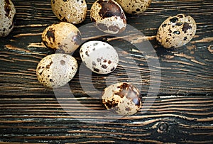 Quail eggs product  on wooden background breakfast , fragility