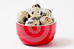 Quail eggs in red