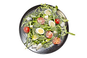 Quail eggs salad on a plate