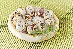 Quail eggs in a wicker basket