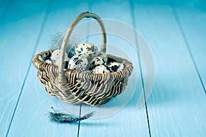 Quail eggs in a wicker basket