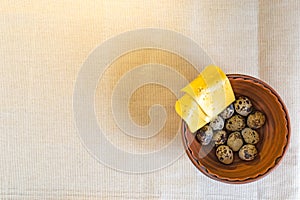 Quail eggs with yellow cheese