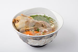 Quail soup in a bowl
