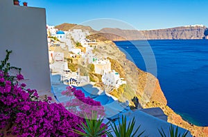 Quaint houses of Oia town Santorini island landscape and Caldera Greece