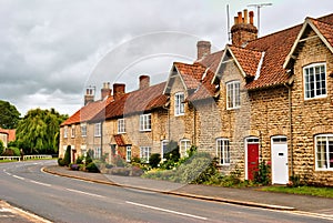 Quaint row of English village houses photo