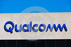 Qualcomm logo sign on headquarters building.