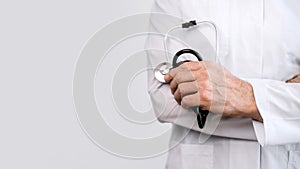 Qualified cardiologist in medical uniform isolated on copy space background