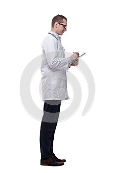 qualified doctor with a clipboard pointing at you . isolated on a white