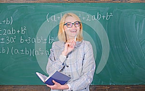 Qualities that make good teacher. Woman teaching near chalkboard. Principles can make teaching effective and efficient