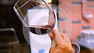 Quality control of red wine at a wine factory