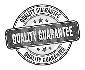 quality guarantee stamp. quality guarantee round grunge sign.