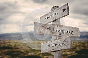 Quality, integrity, trust signpost in nature. photo