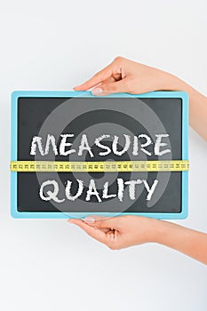 Quality measurement concept on blackboard