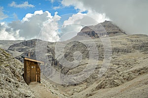 Quality time in wooden outhouse with view on Piz Boe in Dolomite