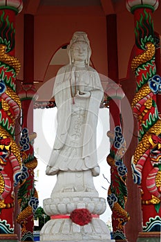 Quan Yin white jade statue in Kuan Yin Shrine of koh loi temple for thai people and foreign travelers travel visit and respect