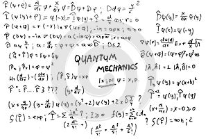 Quantum mechanics. Scientific formulas and expressions. Written by hand on a white background.