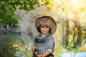 Quarantine. Fishing alone. Sad boy catches a fish.